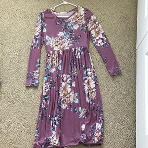 Girls purple, flower print, long sleeve dress. Size medium.